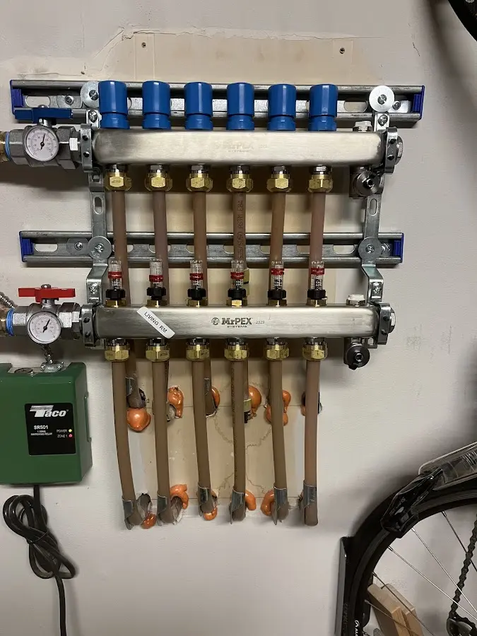 Plumber performing Gas Leak Detection at a residential property in Harpswell